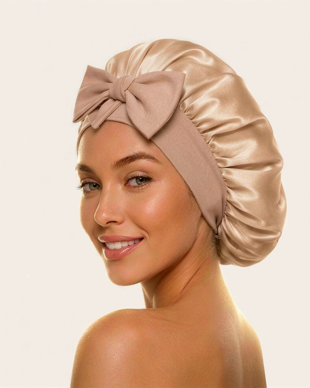 Model wearing the rose gold silk bonnet