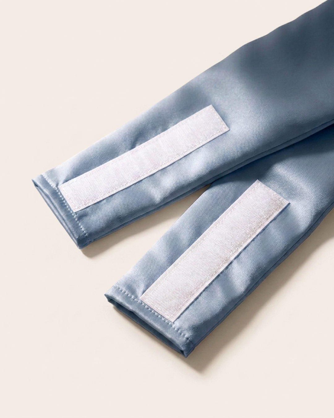 Close-up of the wide silk strap and soft velcro closure on the blue mist sleep mask