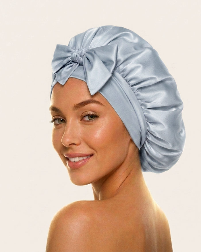 Model wearing the blue mist silk bonnet