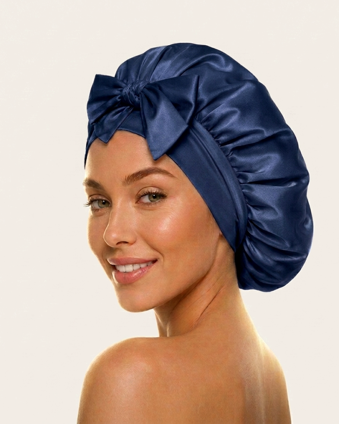 Model wearing the navy silk bonnet