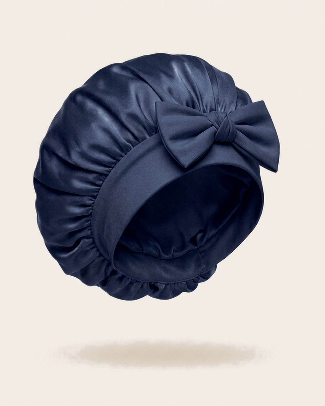 Navy silk bonnet with a mulberry silk crown and soft band