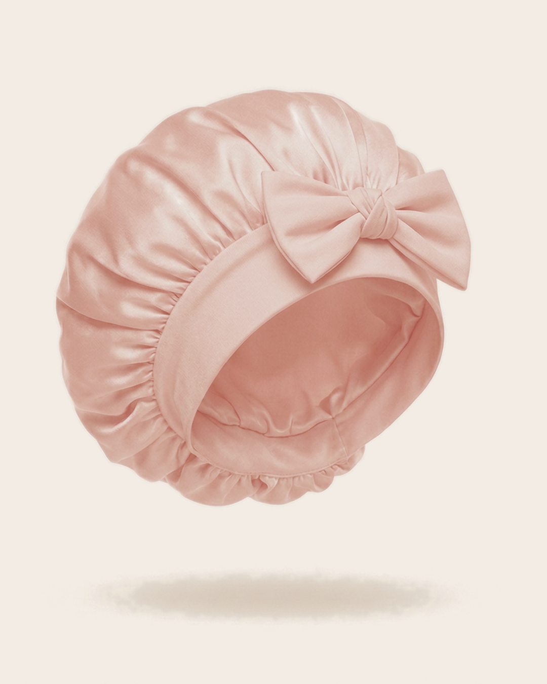 Pink silk bonnet with a mulberry silk crown and soft band