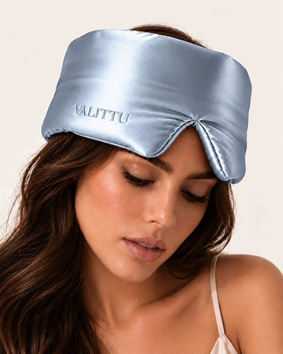Model wearing the blue mist silk sleep mask
