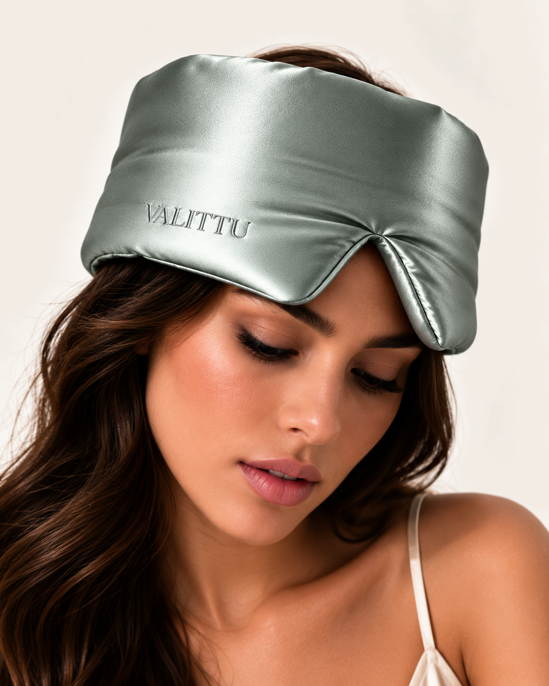 Model wearing the green mist silk sleep mask